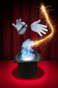 picture of hands in gloves, one holding a wand, simulating a magician. a symbol of AI